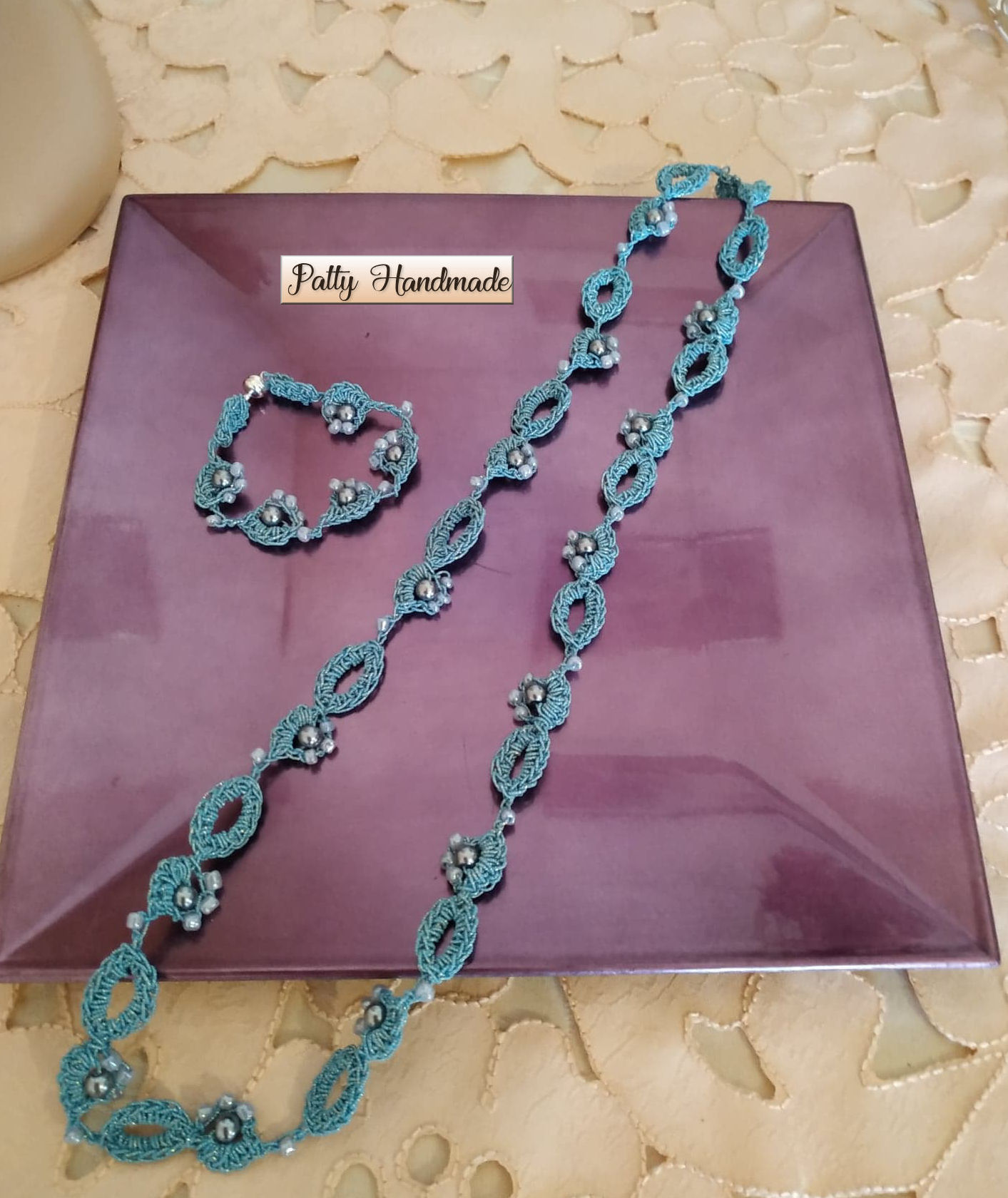 Set collana e bracciale ad uncinetto con perline color turchese