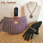 Set donna pochette, collana e bracciale ad uncinetto
