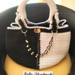 Borsa bicolore realizzata ad uncinetto con cordino di colore bianco e nero