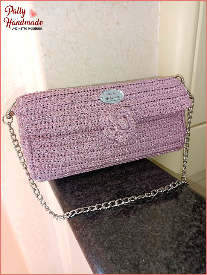 Pochette da cerimonia realizzata ad uncinetto in color rosa cipria